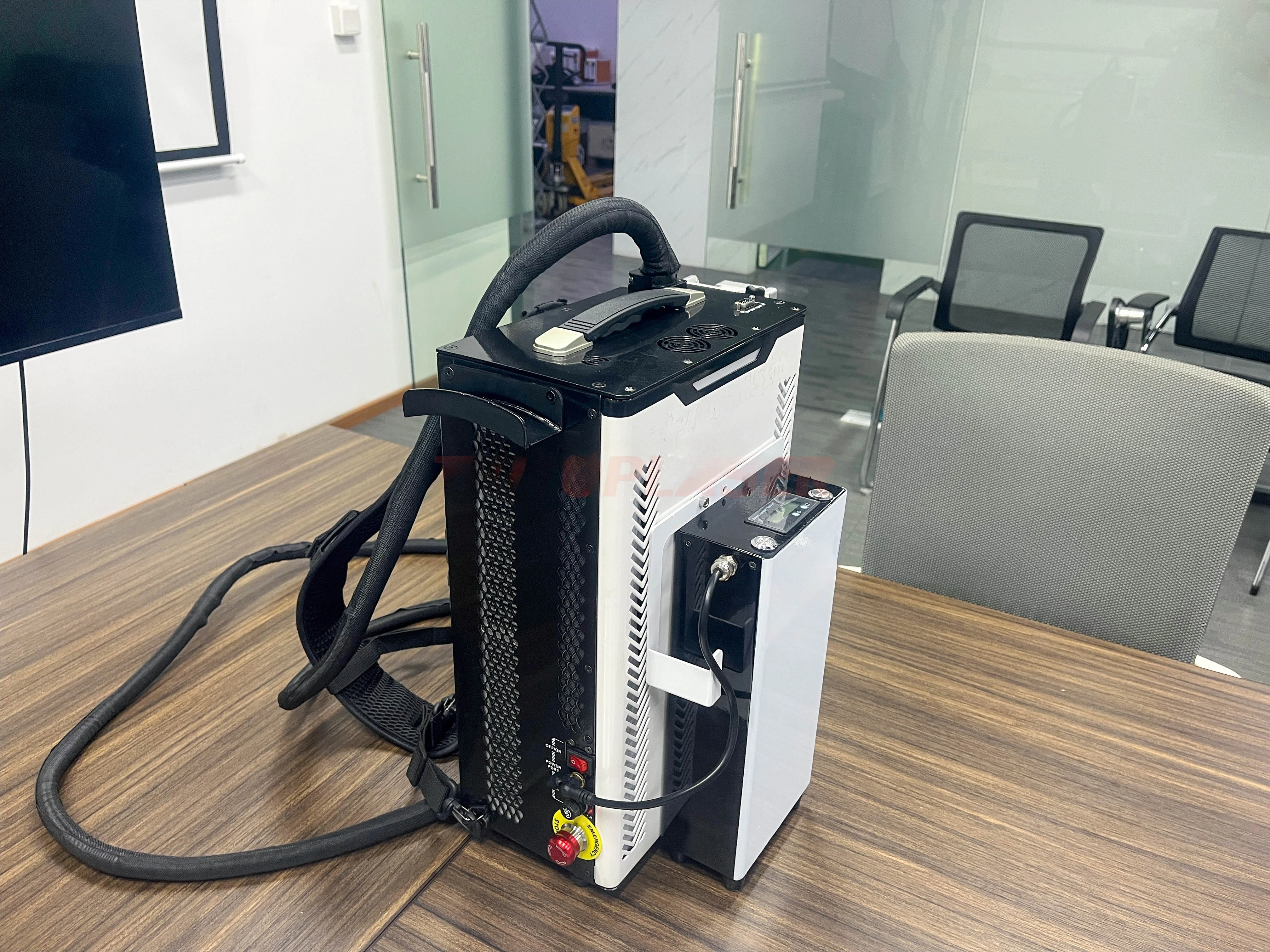 The 300W pulsed fiber cleaning machine, a hot seller in 2026, effectively removes rust and paint from wood.