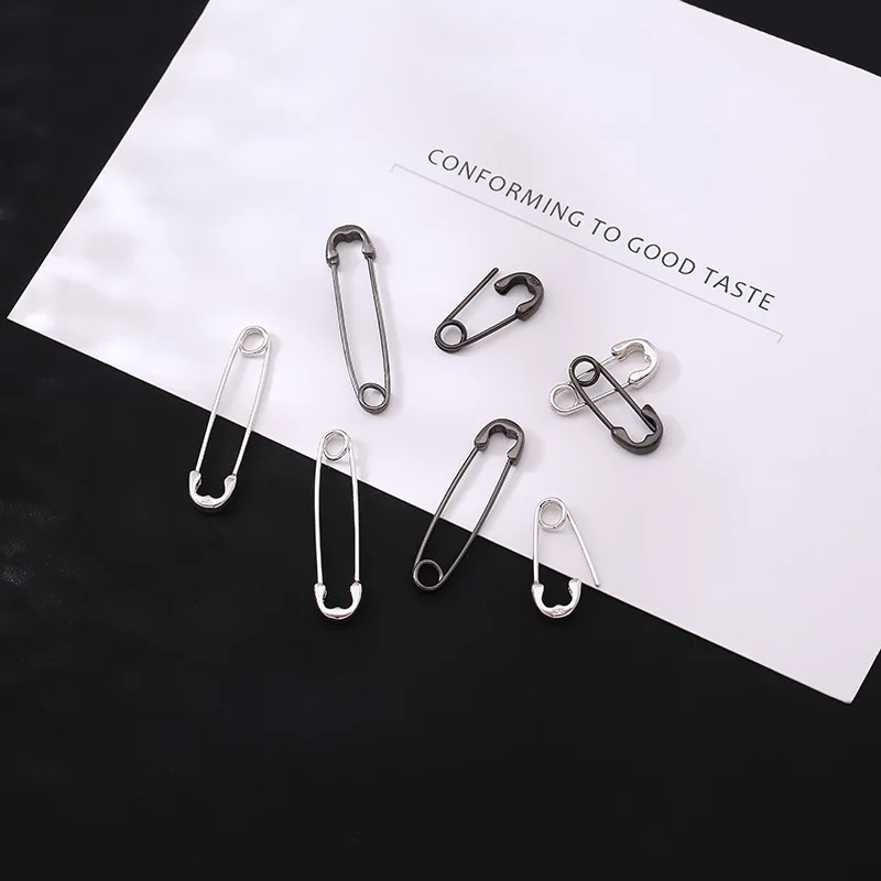 Sprzedaż hurtowa 925 Sterling srebrna szpilka kolczyki New Fashion Hip HopCool przystojny mężczyzna i kobieta klip Ear Stud biżuteria