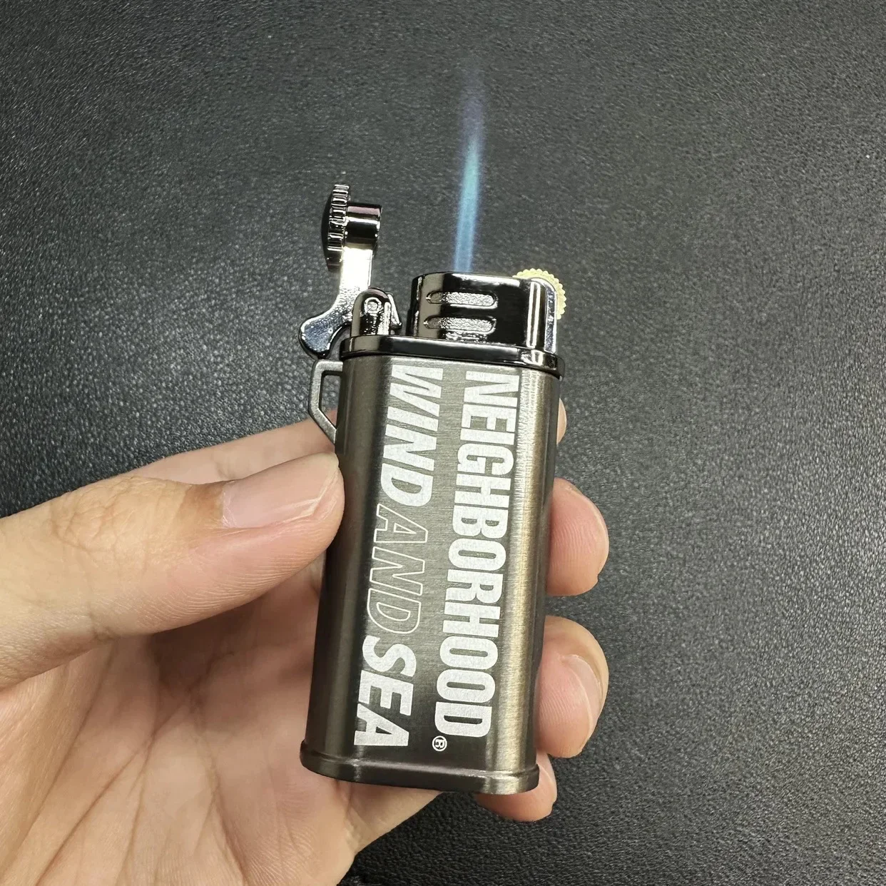 

Creative Trendy Brand Metal Grinding Wheel Gas Windproof Lighter With Unique Design Compact and Personalized Blue Torch Lighter