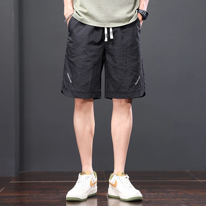 Basic Solid Color Casual Shorts Sports Men's Clothing Youthful Vitality 2024 Summer Loose Straight Fashion Drawstring Knee Pants