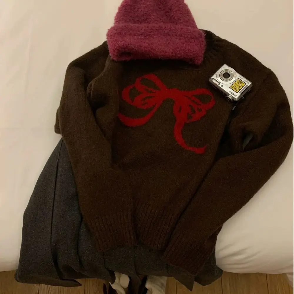

Round Neck Bow Sweater Women Autumn Winter 2025 Korean Lazy Style Loose Knit Pullover Elegant Versatile Long Sleeved Top