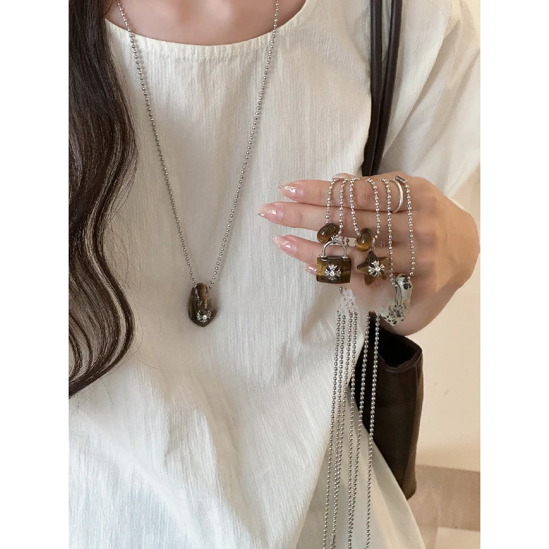 colar-de-pedra-olho-de-tigre-natural-para-mulheres-novo-design-popular-e-exclusivo-acessorio-de-corrente-longa-de-alta-qualidade-para-sueter