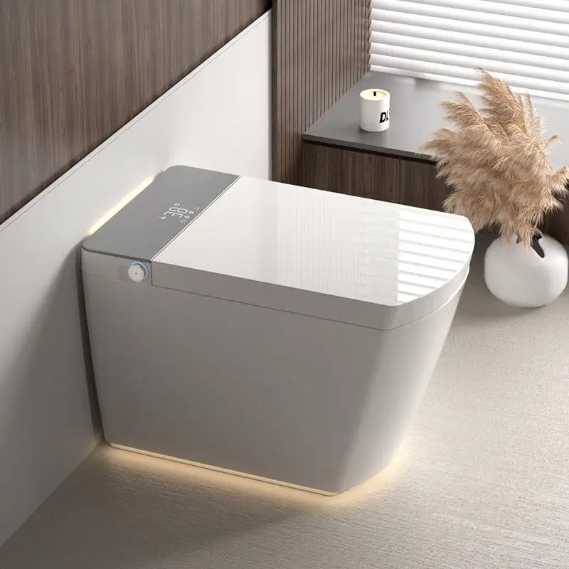 

Smart Toilet with Auto Open/Close Lid, Heated Seat, Instant Warm Water Cleaning, Auto Flush, Remote Control, Foot Sensor Flush