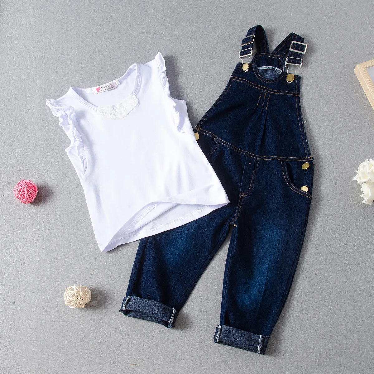 Fashionable Girl Set with White Cotton Lace Patchwork Fly Sleeved T-shirt and Denim Suspender Pants for Outdoor Use