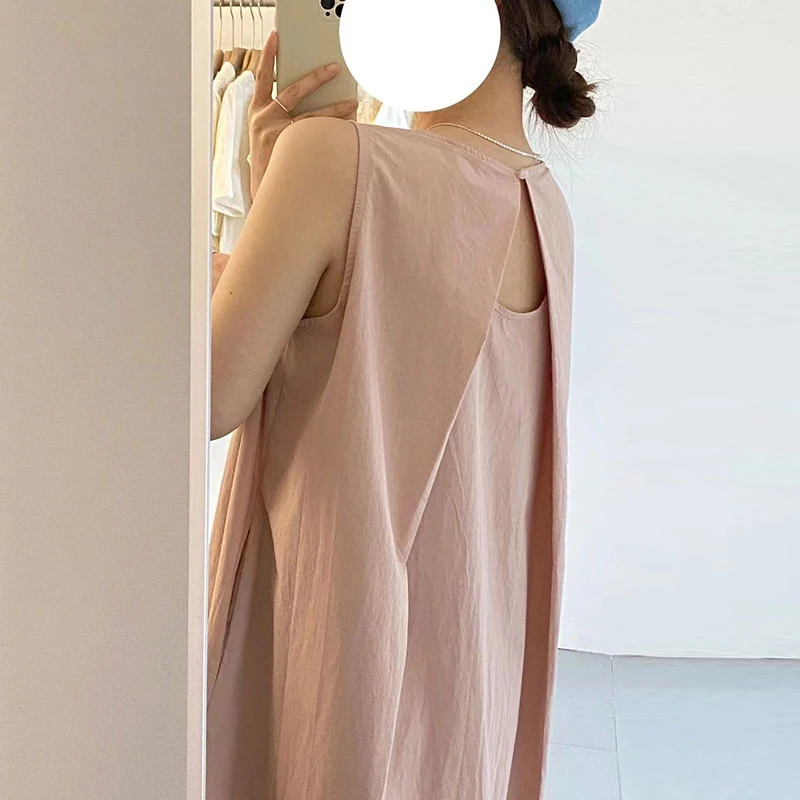 เสื้อกั๊กทรงหลวมสไตล์เกาหลีสีชมพูพาสเทล ดีไซน์เก๋ไก๋ พร้อมกระโปรงทรงเอ สไตล์ลำลอง ผ่าข้าง เหมาะสำหรับฤดูร้อน