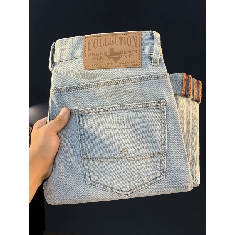 2025 nuovi jeans casual bianchi lucidi retrò americani da uomo in autunno, pantaloni lunghi a gamba piccola slim fit di colore chiaro