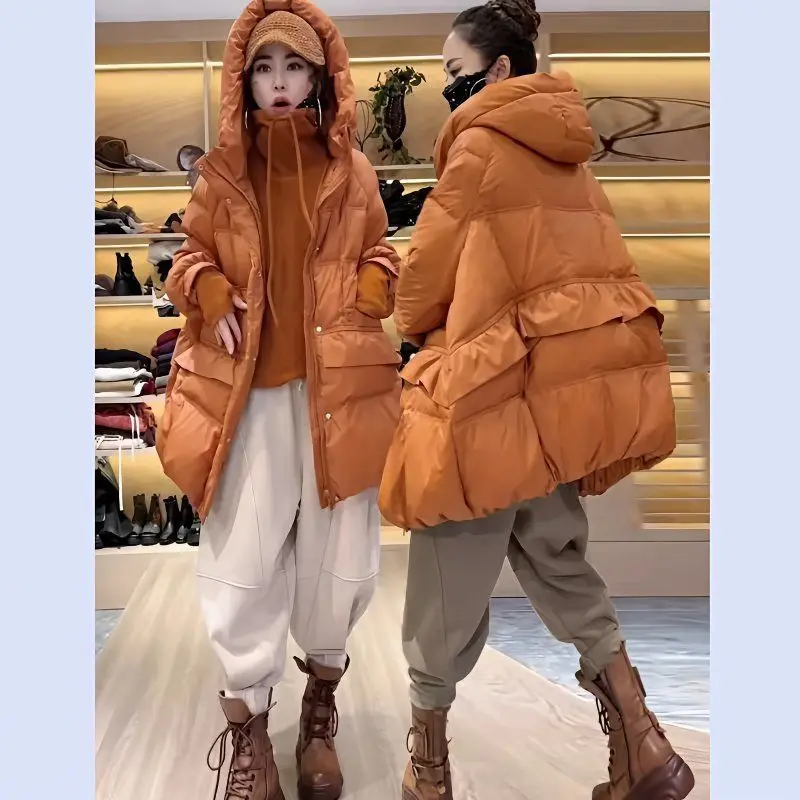 Pato branco para baixo jaqueta feminina anti-temporada especial nova moda solta médio e longo engrossado quente com capuz design de cor sólida