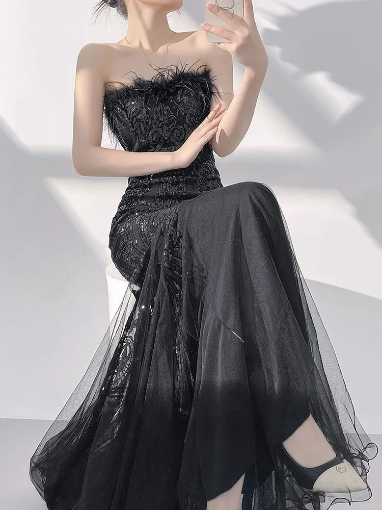 

Black banque-themed strapless sequined tulle host fishtail dress