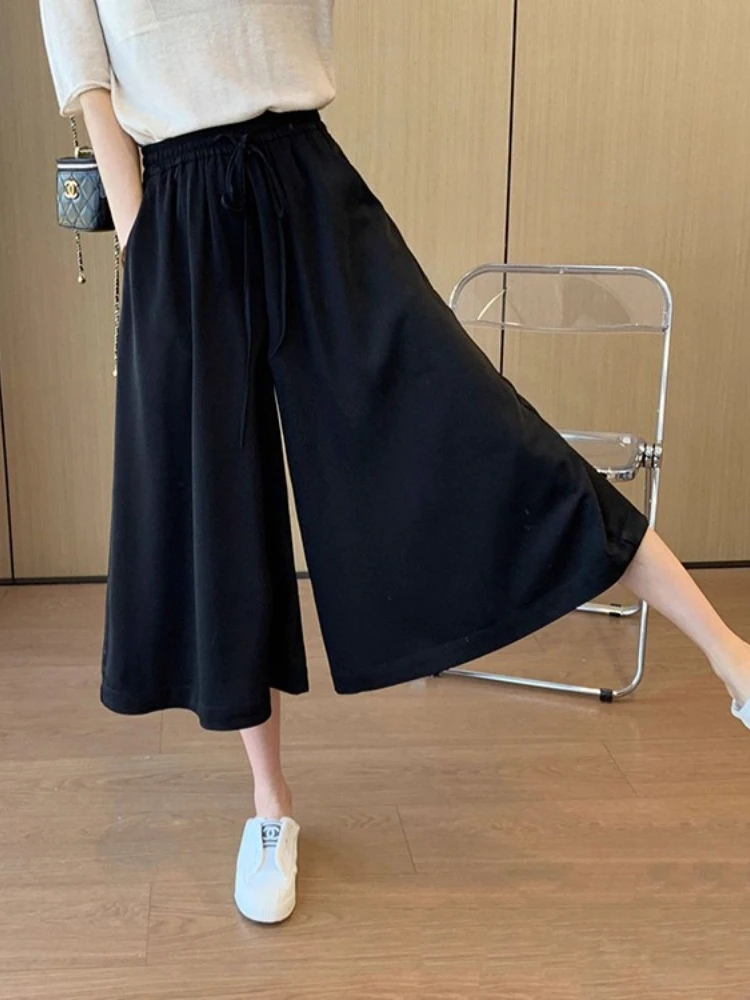 Novedad de verano, pantalones cortos de pierna ancha de seda de hielo para mujer, pantalones sencillos holgados informales finos y cómodos de Color Solic para ir al trabajo