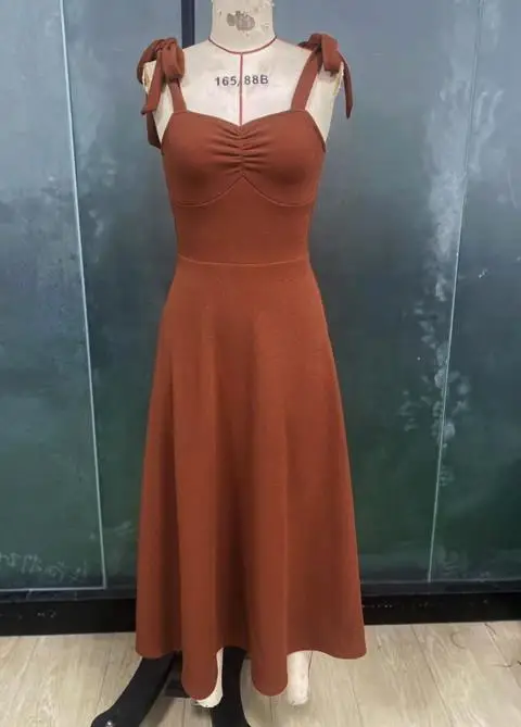 Abito da donna Moda 2025 Ultimo abito temperamento di vendita caldo Abito gilet tinta unita Vita che abbraccia gonna di media lunghezza dimagrante