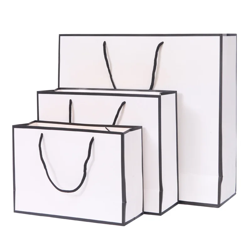 10/100 pezzi Logo personalizzato grande borsa per la spesa in carta bianca con bordo nero e manico a nastro per confezione regalo di vestiti