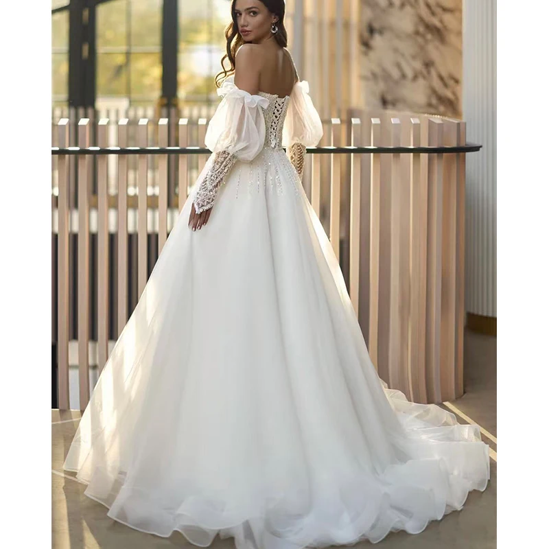 فستان زفاف أنيق من الأورجانزا مع ترتر مطرز على شكل حرف a بطول الأرض وأكمام منتفخة قابلة للفصل بدون حمالات حسب الطلب