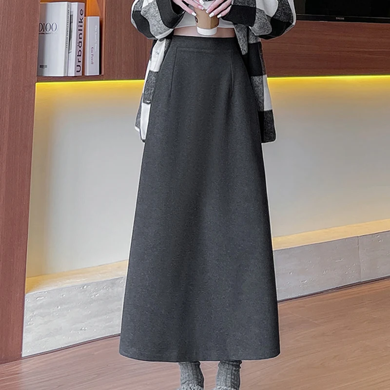 Długie spódnice damskie z wysokim stanem na jesień i zimę 2025, nowe, jednolite, uniwersalne spódnice w kształcie litery A z rozcięciem z tyłu.