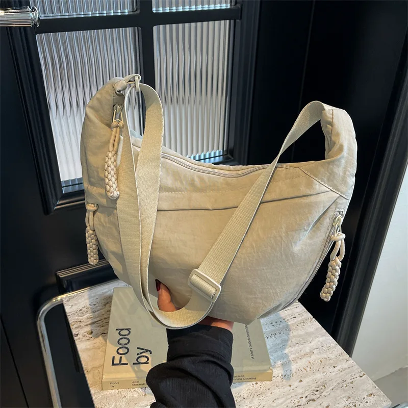 

Stylish Japanese Women Crossbody Bag Large Capacity Pure Color Versatile Dumpling Bag Lightweight Commute Student Shoulder Bag
