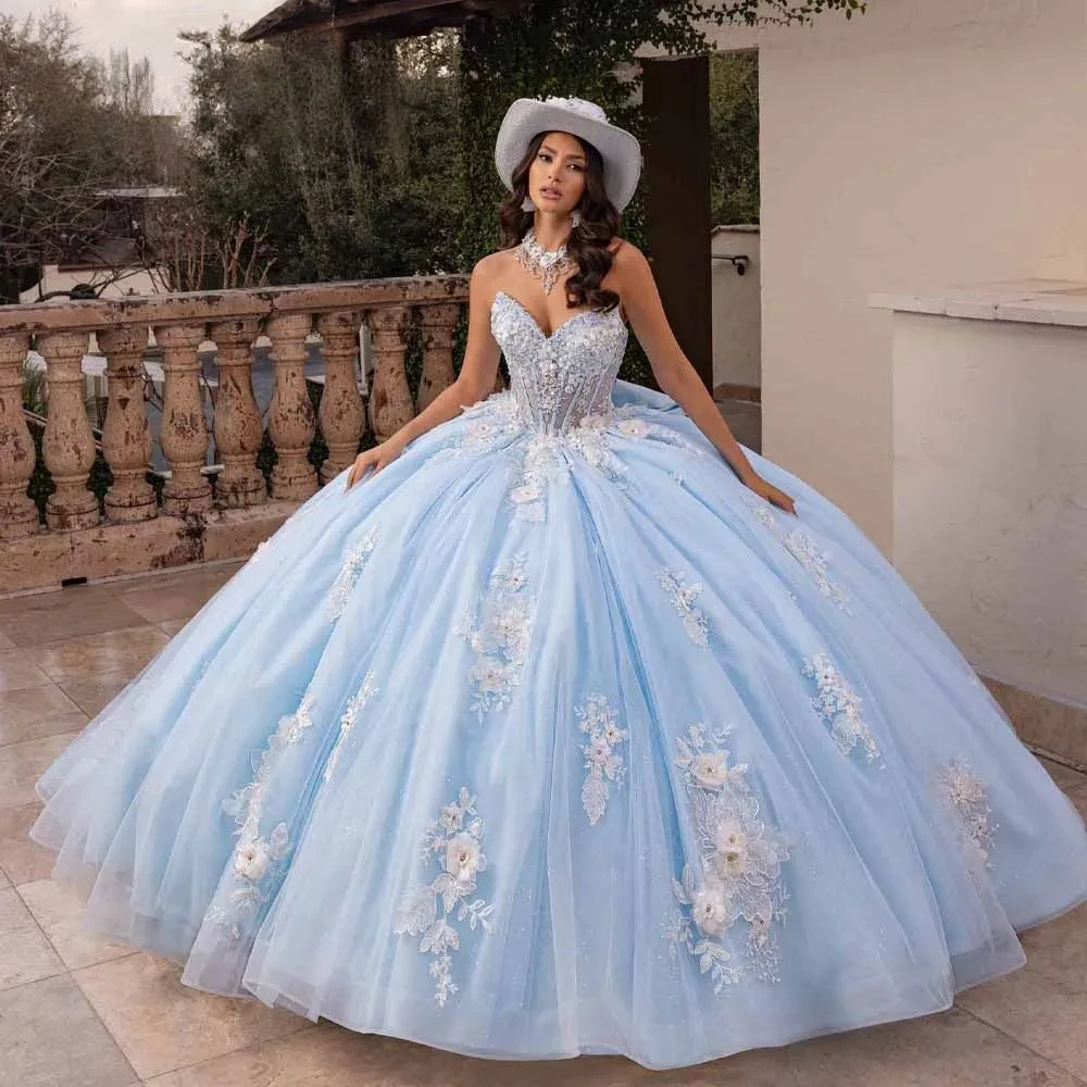 ชุดราตรีงาน Quinceanera แบบแฟนตาซี พร้อมโบว์ใหญ่ด้านหลัง ประดับลูกไม้ลายดอกไม้ ผ้าทูลล์สไตล์ Charro ชุด Sweet 16 สำหรับงานฉลองอายุ 15 ปี สามารถสั่งตัดได้