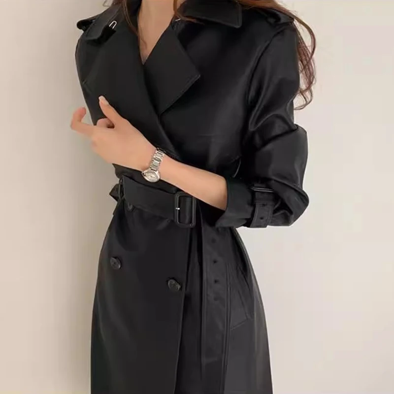 Clothland Women Stylish Black PU Leather Trench Coat Double Breasted Belt Long Sleeve Windbreaker Long Thick Jacket CB187