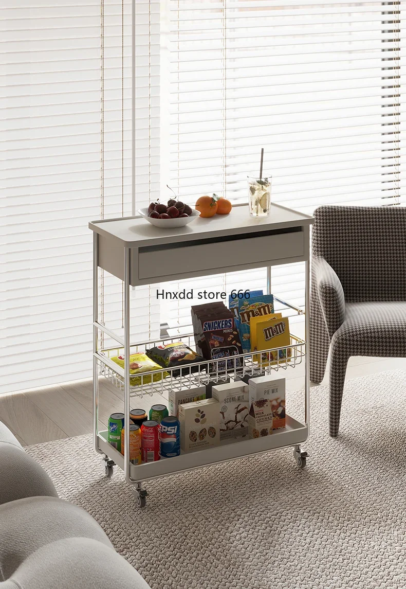 A few small coffee tables by the sofa, multi-layer shelves, side tables