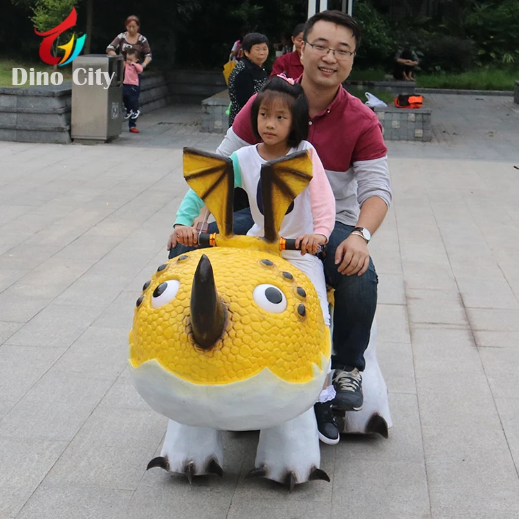 Kid Playing Animatronic Walking Dinosaur Ride on Toy