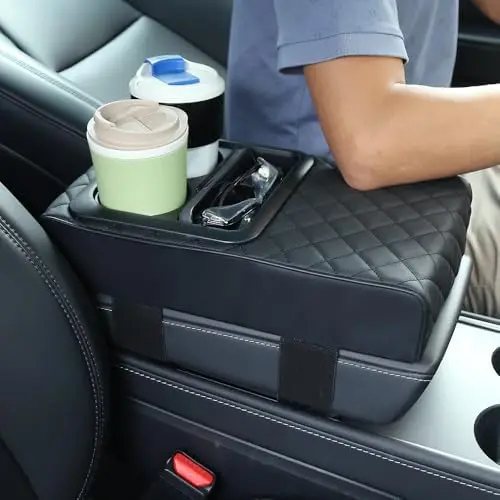 

Supin Car Armrest Cushion with Cup Holder & Phone Storage – Faux Leather, Ergonomic Design, All-Season Use (Black)