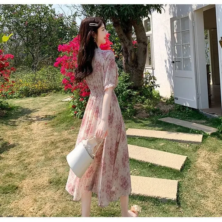 ชุดเดรสลายดอกไม้เอวอ่อนโยนในฤดูร้อนกระโปรงยาวทรงสลิมอารมณ์เล็ก