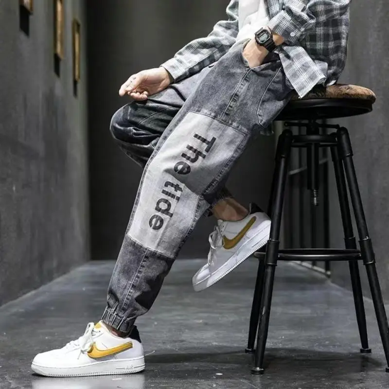 Pantalones vaqueros Cargo empalmados para hombre, ropa de calle con estampado de letras, Hip Hop, moda de otoño, novedad