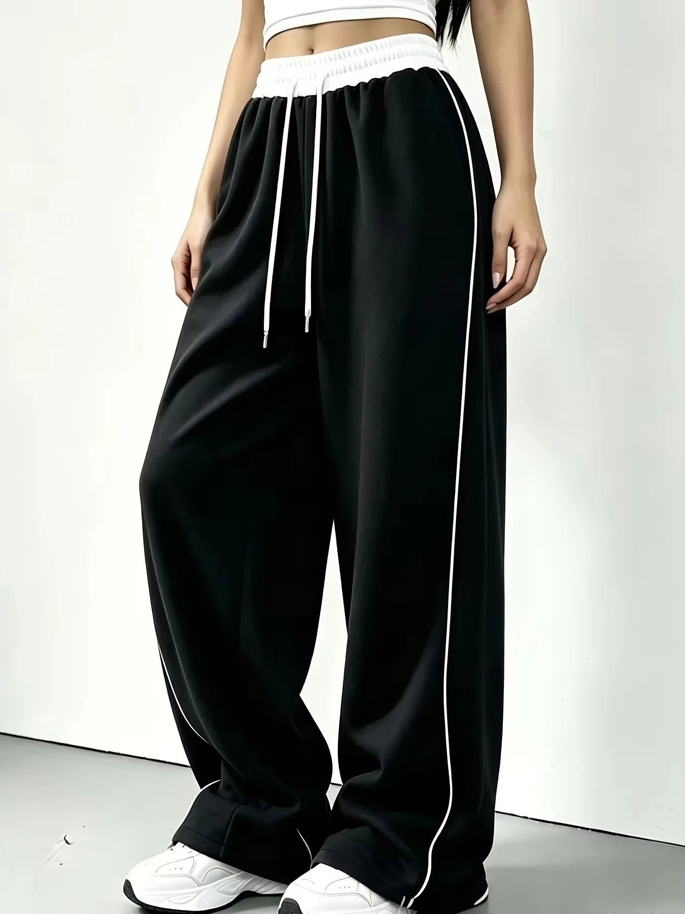 Unisex, schnelltrocknende, gerade geschnittene, lange Hosen im Hip-Hop-Stil, mit kontrastierender weißer Seitenlinie, lässige Streetwear-Hosen, lockere, weit geschnittene Sporthosen für Kinder. – Detail 4