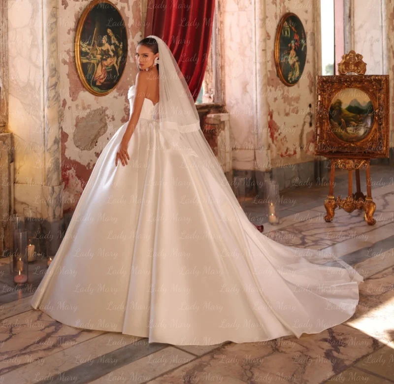 

Свадебные платья принцессы на заказ 2025 года: атласные, с бисером, без бретелек, формальные, с кружевной шнуровкой на спине, для церемоний в церкви (Robe De Mariée)