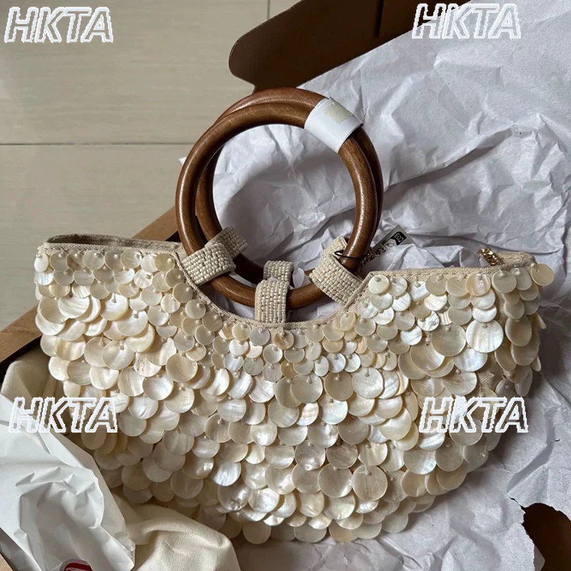 Elegante 2025 verão novo artesanal natural bege concha saco para senhoras moda nicho personalidade na moda bolsas femininas