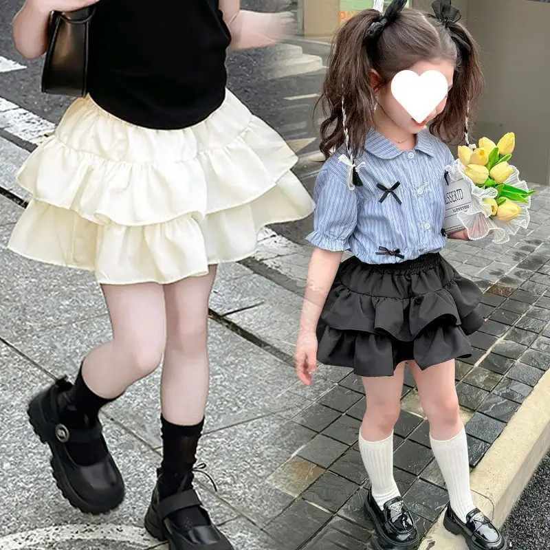 تنورة منفوشة مرنة عالية الخصر للفتيات على طراز Preppy تنورة مزدوجة الطبقات بطيات مكشكشة بحافة كعكة صغيرة تنورة لطيفة Y2K