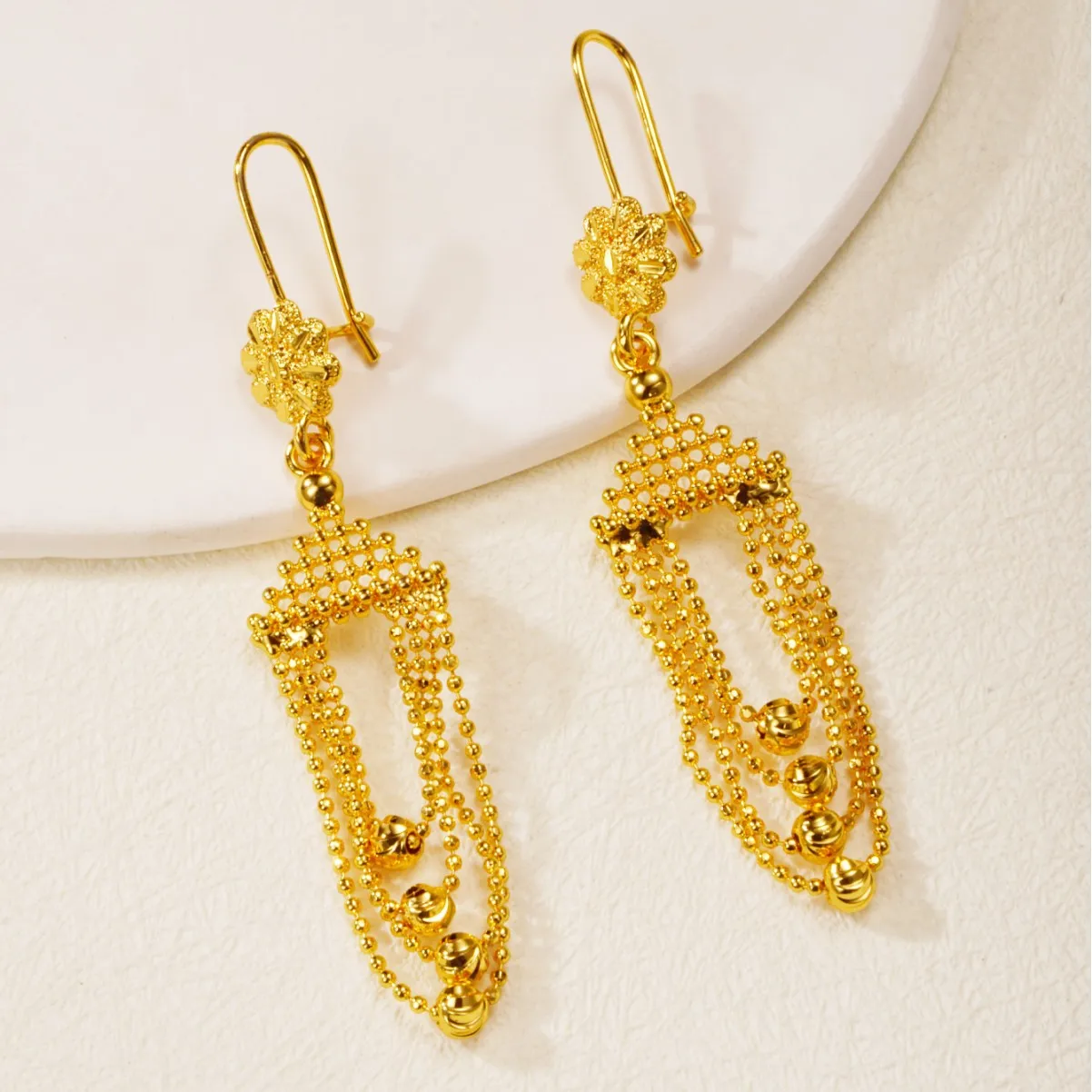 9999 gold fringed fan-shaped earrings - fashionable metal style ear studs with bold and unique design
