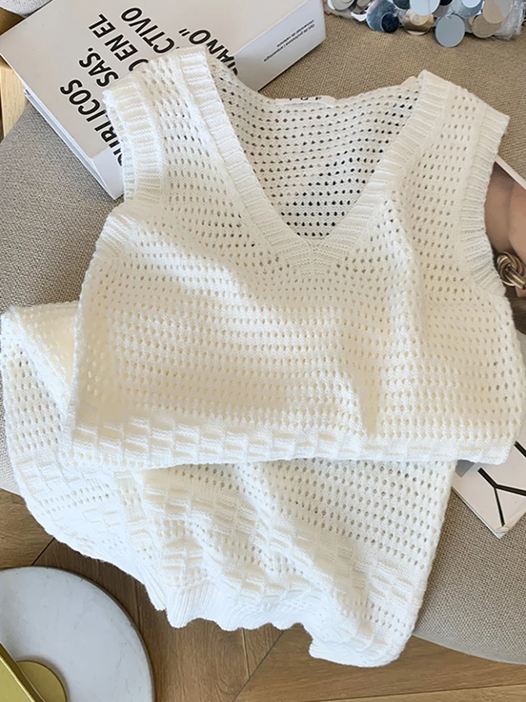 Sommer Einfache Mode Aushöhlen Gestrickte Kleid für Frauen Sexy Chic V-ausschnitt Ärmellose Dünne Kleider Spicy Girl Mini Kleider