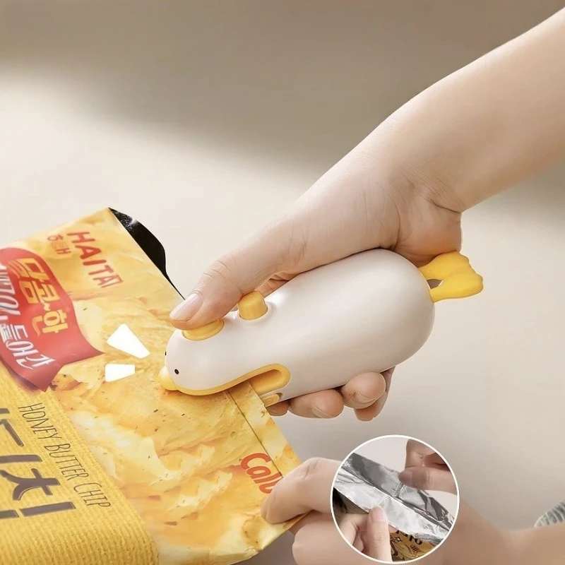 

Маленький портативный мини-аппарат для вакуумной упаковки пищевых продуктов, упаковщик пластиковых пакетов, устройство для запечатывания закусок