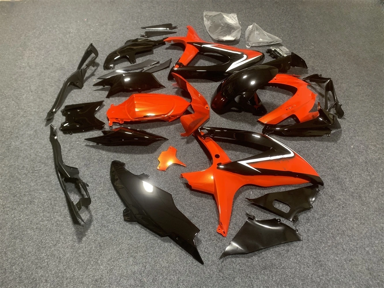 The motorcycle fairing kit is suitable for GSXR600 2008 2009 2010 K8 GSXR750 08 09 10 fairing black orange motorcycle housing