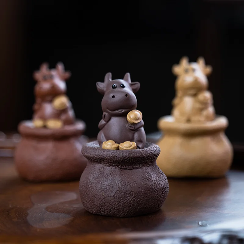 Yixing Zisha té mascota buey estatuilla doce zodiaco Yuanbao dibujos animados Baggy buey escultura juego de té accesorios adecuados para cría
