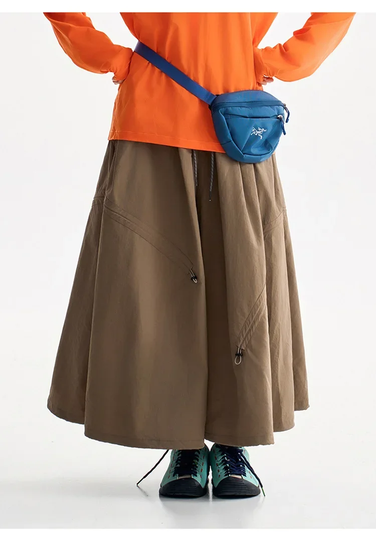 Multifunktionale Tech-Hose für Damen mit wandelbarem Saum, Tragegriff hinten, leicht, wasserabweisend, für Stadt und Outdoor, elastischer Bund. – Detail 24
