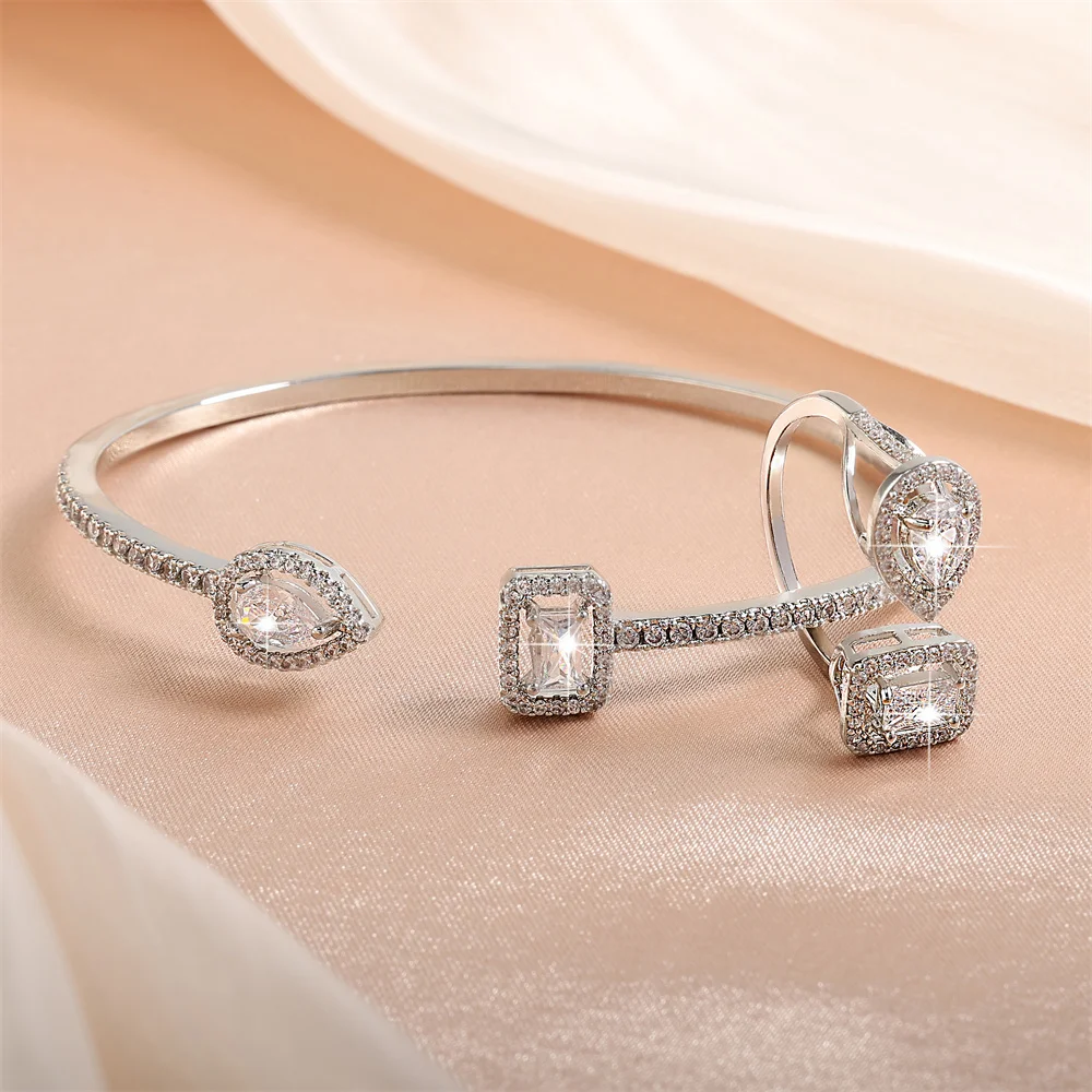 ZAKOL 2-teiliges Set Luxuriöses Geometrisches Quadratisches Wassertropfen-Armreif- und Ring-Set für Damen mit AAA-Zirkonia Hochzeitsschmuck – Detail 12