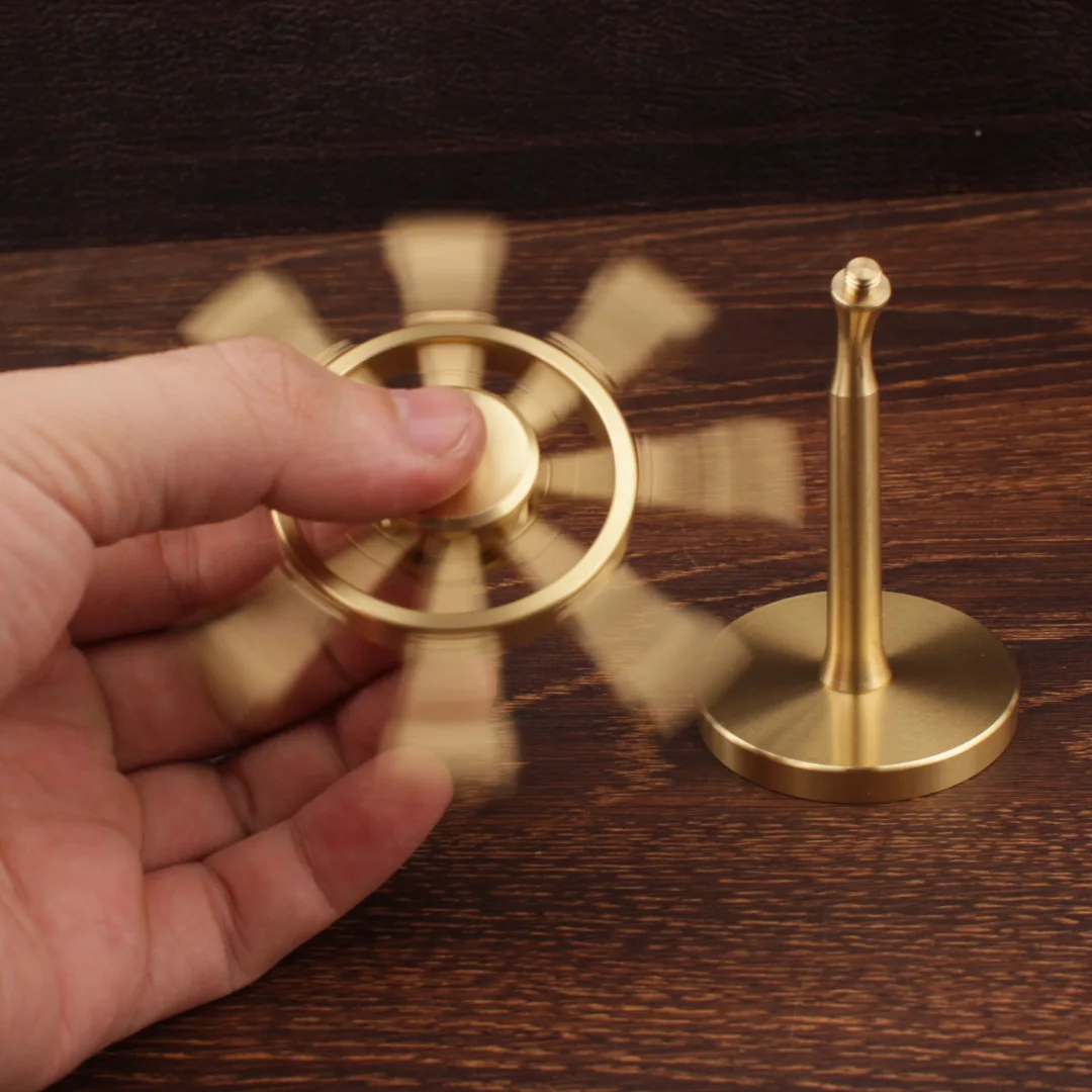 

Antique brass nautical steering wheel rudder. 3.5-inch free-spinning top. Golden maritime replica for home/office decor, fidget