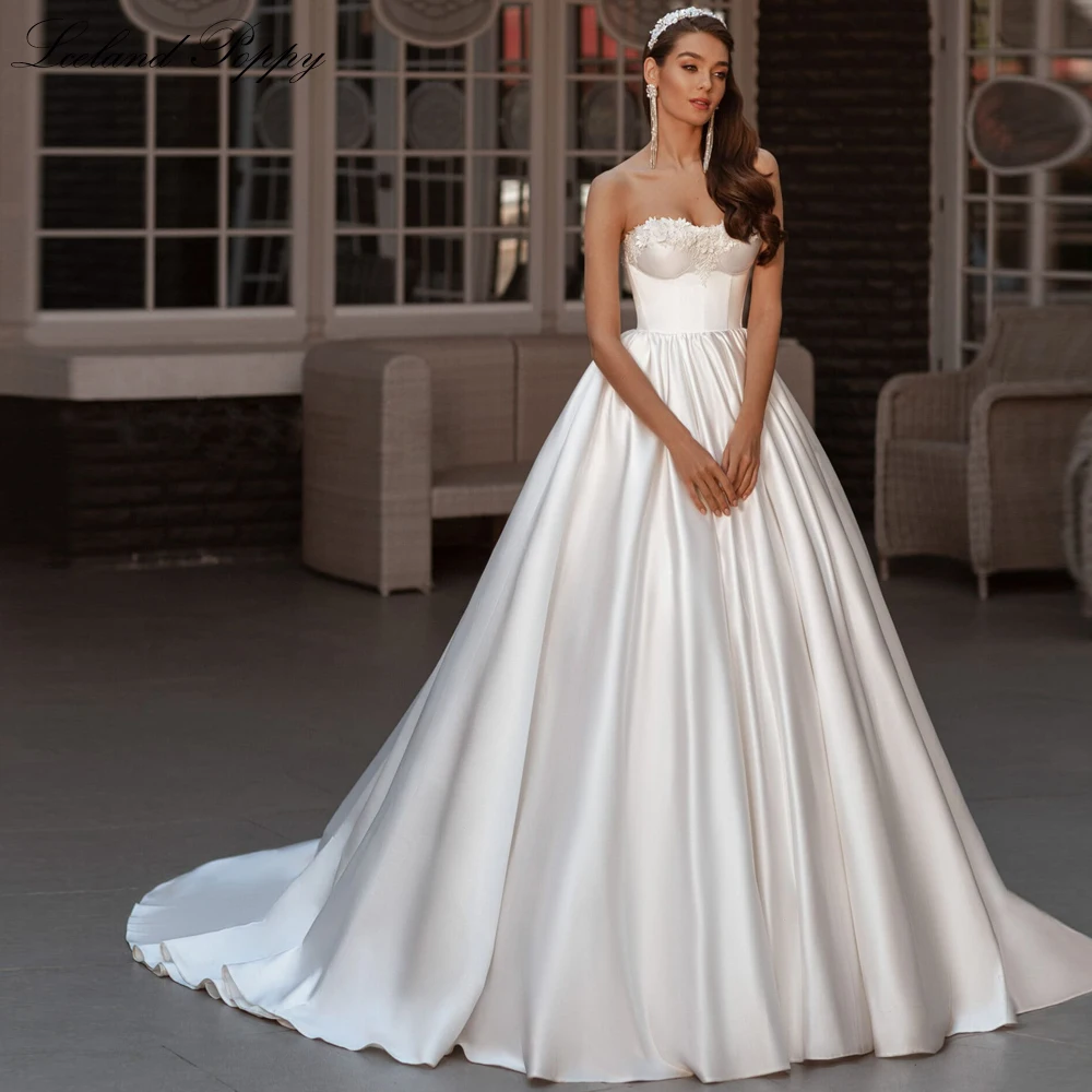 

Lceland Poppy A Line Strapless Satin Wedding Dresses Sleeveless Beaded Empire Waist Bridal Gowns with Court Train