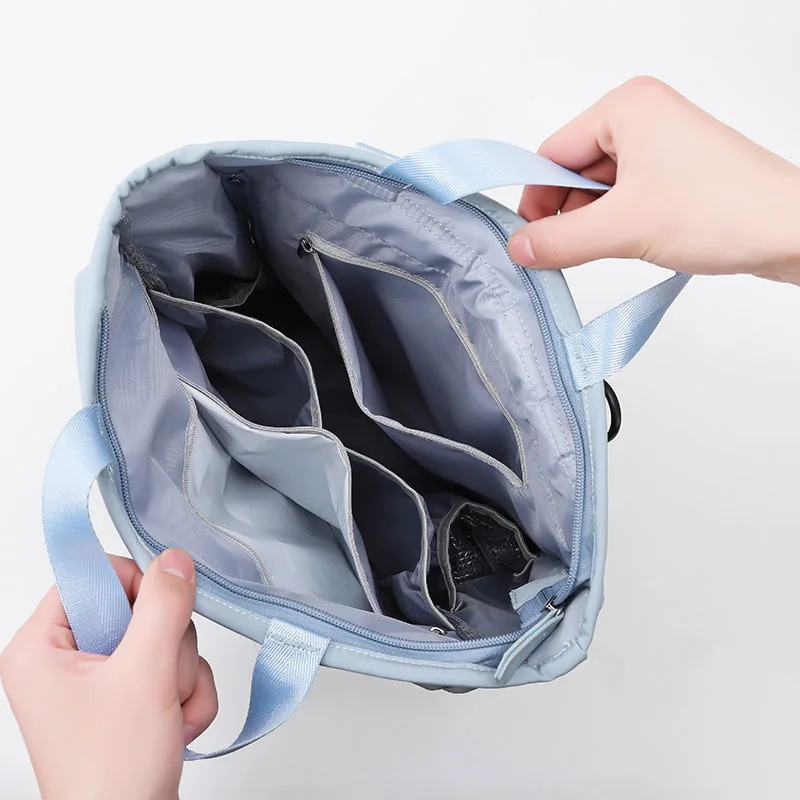 Mochila impermeable multifuncional para mamá, bolsa de pañales de gran capacidad para madre y bebé, mochila ligera para mujer