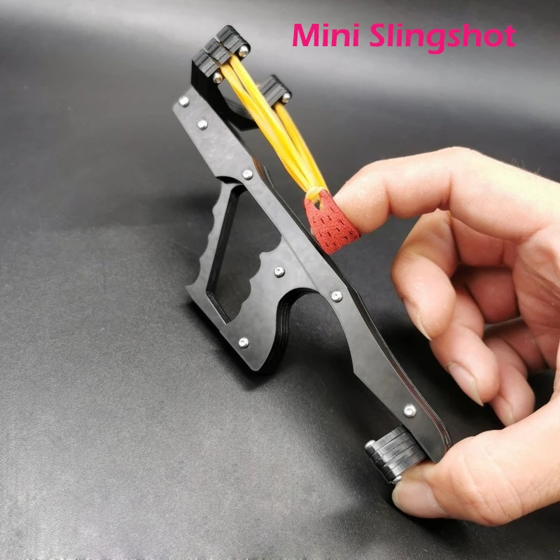 

Mini Slingshot with Grip Carbon Plastic Material To Play Mud Ball Small Slingshot Rubber Band Bow Catapult Toy