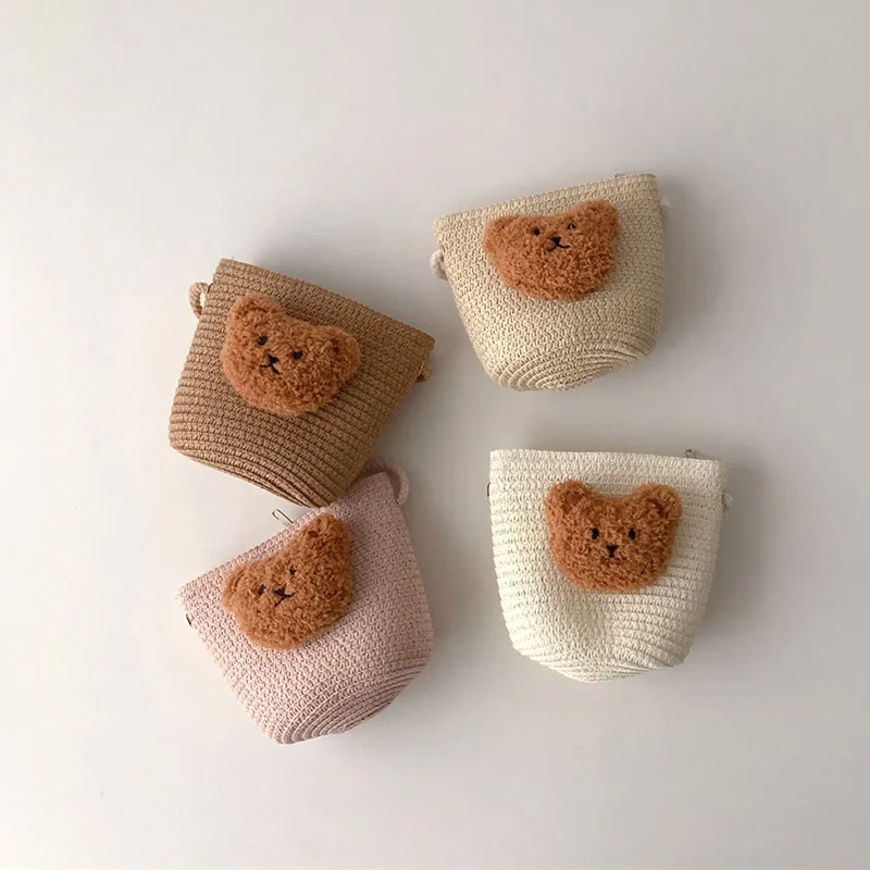 เกาหลีน่ารักหมีเด็กCrossbodyกระเป๋าฤดูร้อนHandmadeทอฟางไหล่กระเป๋าสําหรับสาวท่องเที่ยวกลางแจ้งเด็กกระเป๋าถือเหรียญ