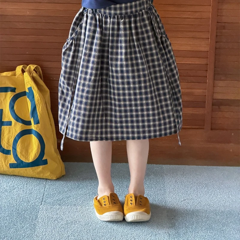 Girls' Summer Leisure 2026 New Korean Style Self Decorated Ribbon College Artistic Retro Black Plaid Skirt