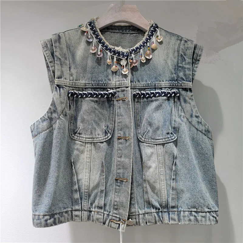 

Heavy-Fringe Denim Vest. Slim-fit, distressed & edgy for 2025. Vintage reborn.