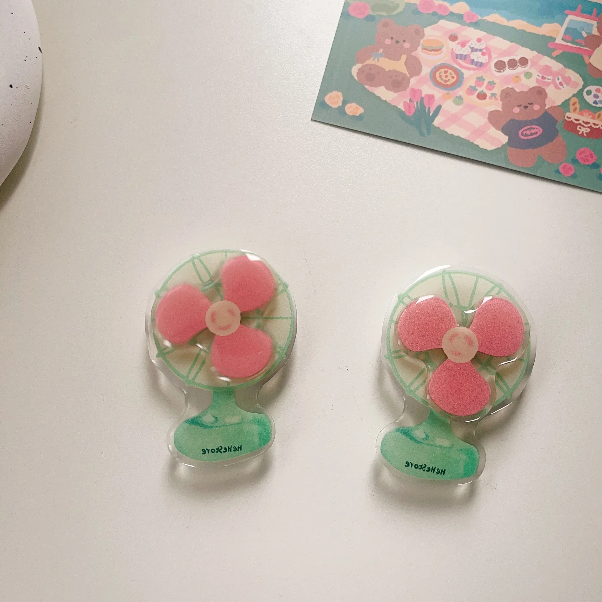 Leuke roterende ventilatorstandaard Geschikt voor elke telefoon Airbagstandaard 3m zelfklevende desktop Lazy Artefact telefoonhouder