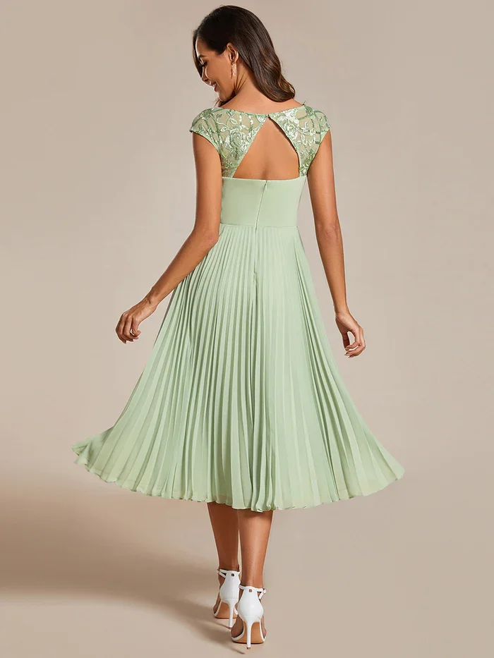 A-Line Pleated Chiffon Tea Length Wedding Guest Dress with Round Neckline and Cap Sleeves