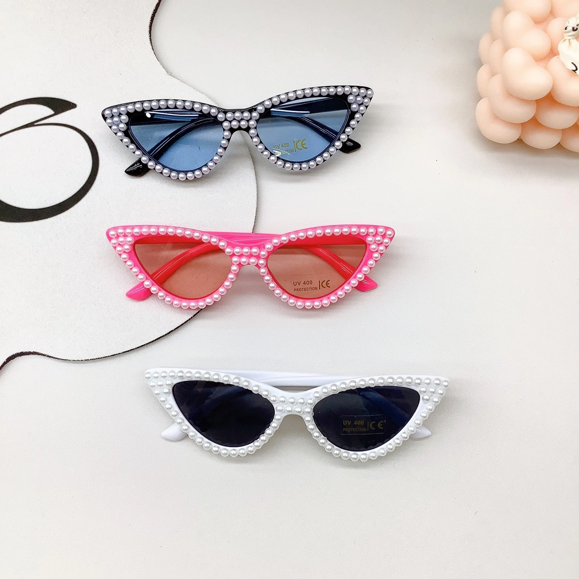 Fashionable children's sunglasses with concave design trend. Fashionable baby sunglasses are UV resistant and trendy for both