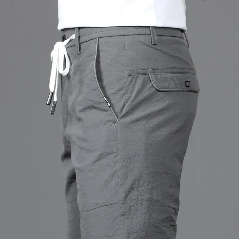 Summer New Solid Color Fashion Straight Pants Man High Street Casual Drawstring Zipper Pockets Elastic Waist All-match Trousers
