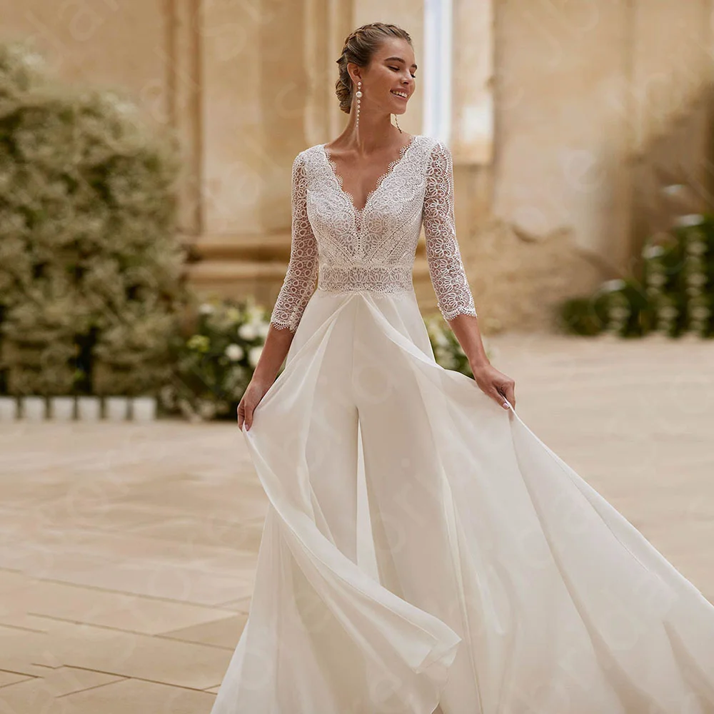 

Customized New Unique Wedding Dresses Jumpsuit Bridal Gowns Pants Suite Lace Bride Dresses 3/4 Sleeves Wedding Gowns V Neckline
