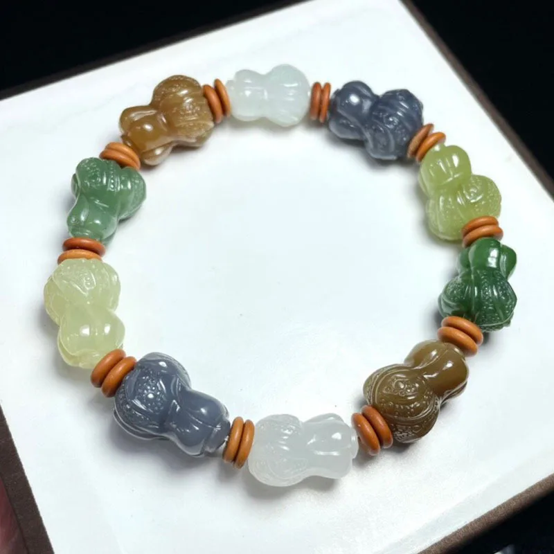 

Hetian Multi-Gem Сахарная капуста Желтый материал для рта Нефритовый браслет «Сто богатства»