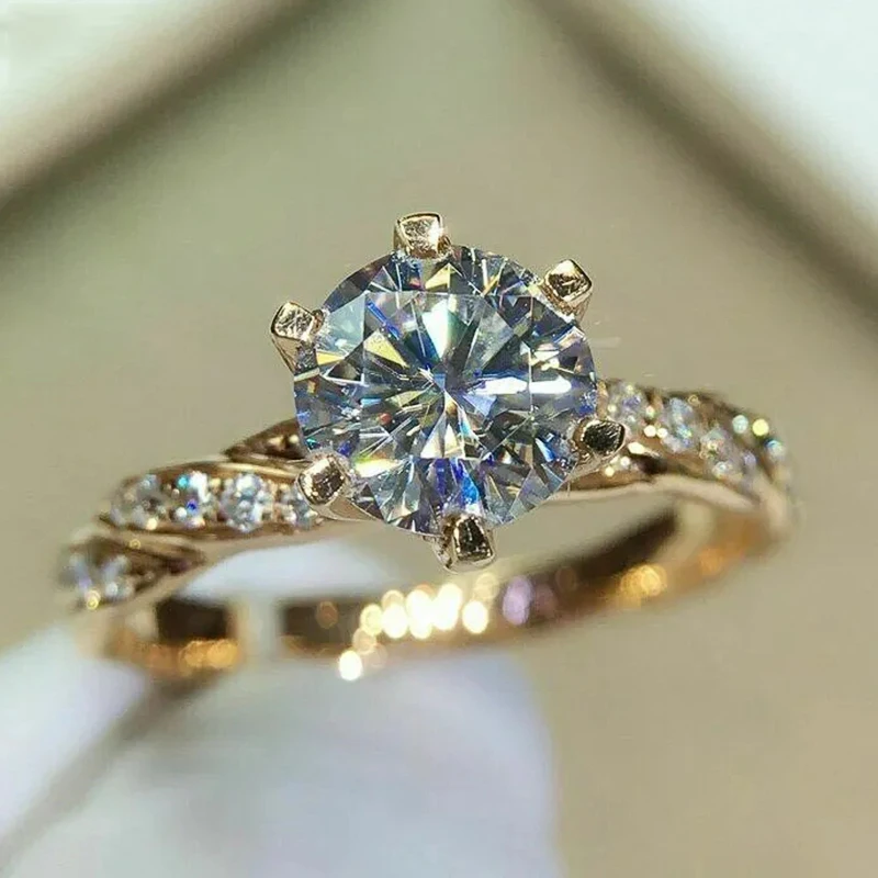Huitan Fancy Twist Band Runde Zirkonia Einstellungen Frauen Ringe Gold Farbe Vorschlag Hochzeit Zubehör Mode Schmuck Groß